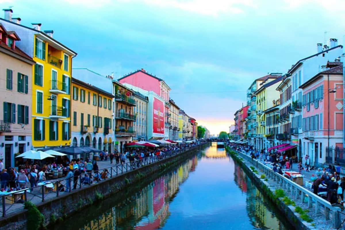 Aperitif by boat on the Navigli The view of the boats at sunset.