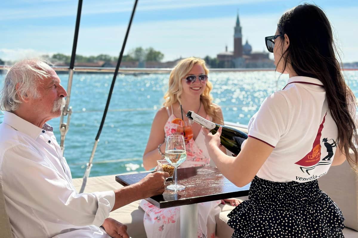 Venice Lagoon: Catamaran Tour with Lunch Waitress with guests