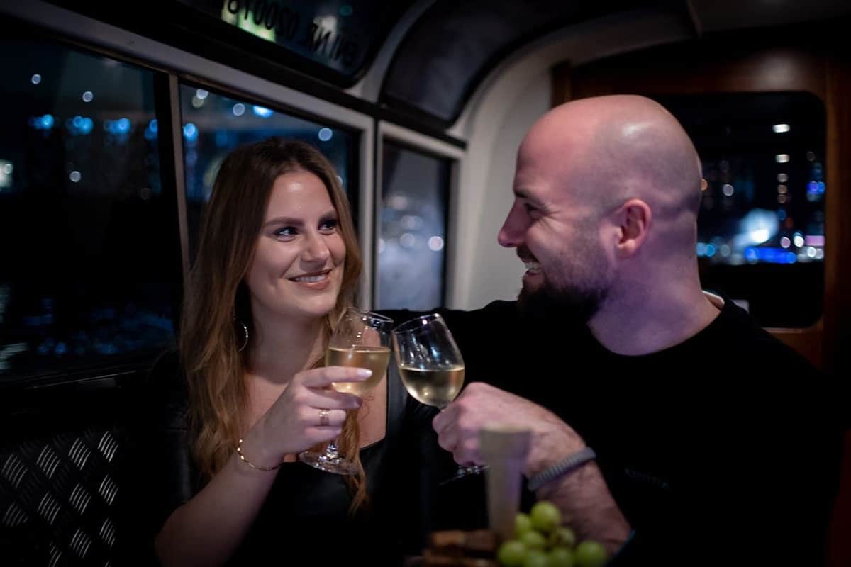 Amsterdam: Wine + Cheese Canal Cruise Couple enjoying wine