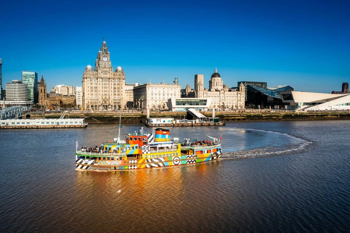 Mersey Ferry River Explorer Cruise The Dazzle Ferry in front of the Three Graces