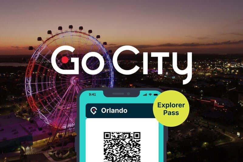Orlando Explorer Pass2 - 5 attractions, dont l'aquarium SEA LIFE Un laissez-passer numérique pour Pass s'affiche sur l'écran d'un smartphone, sur fond de nuit avec une grande roue très éclairée.